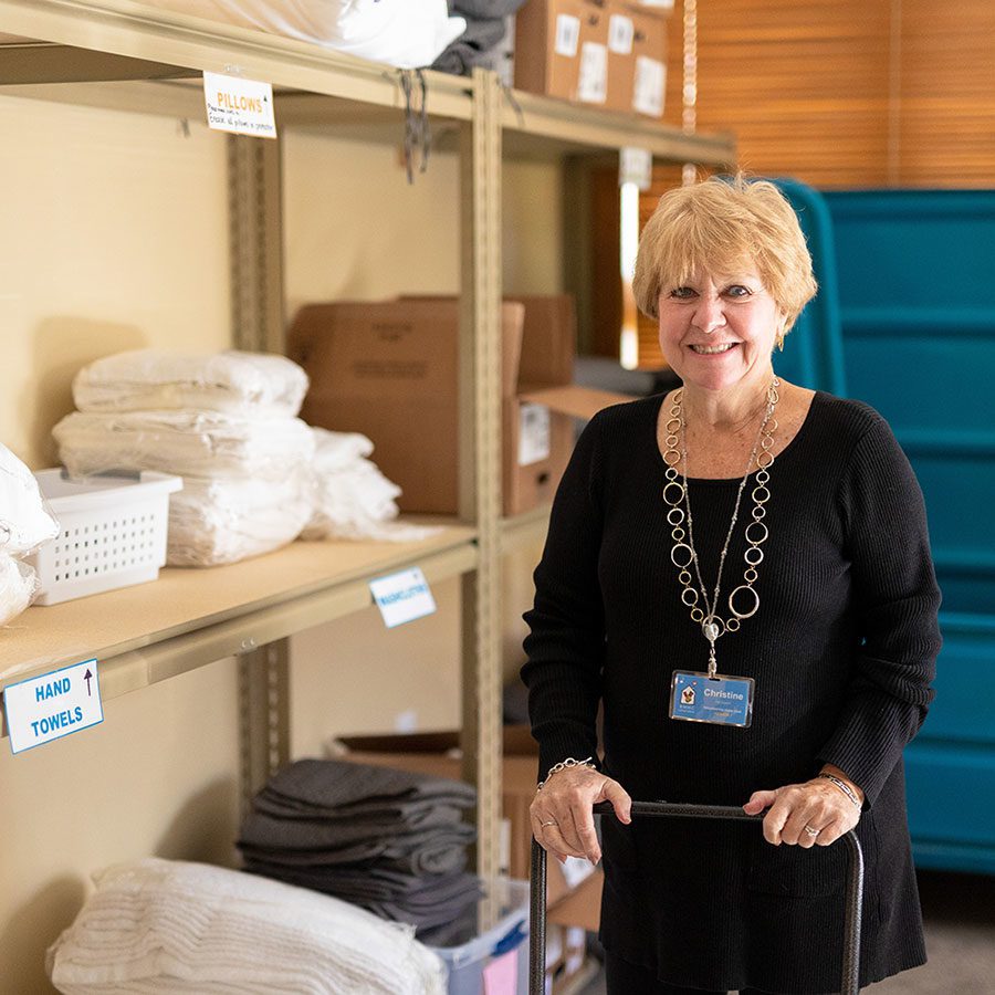 volunteer in organized storage room