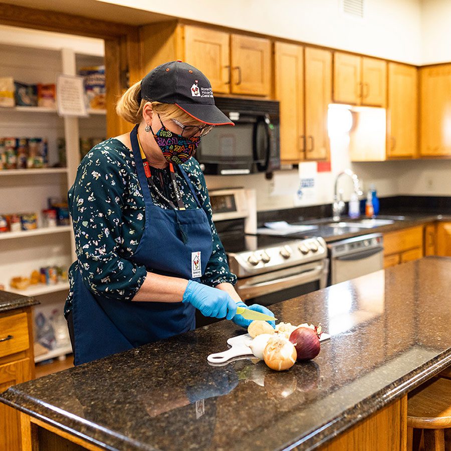 culinary volunteer working in kitchen