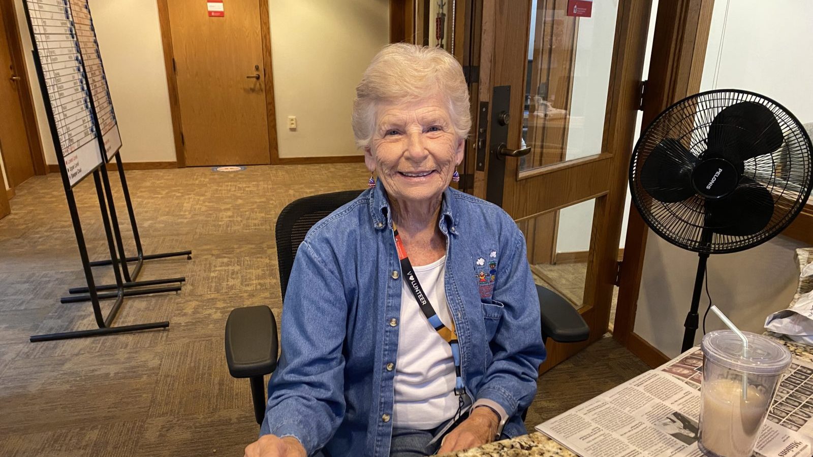 Jo Plant smiling at the Ronald McDonald House front desk