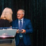 Pete Wojtowicz accepts a Lori Kleiman Award